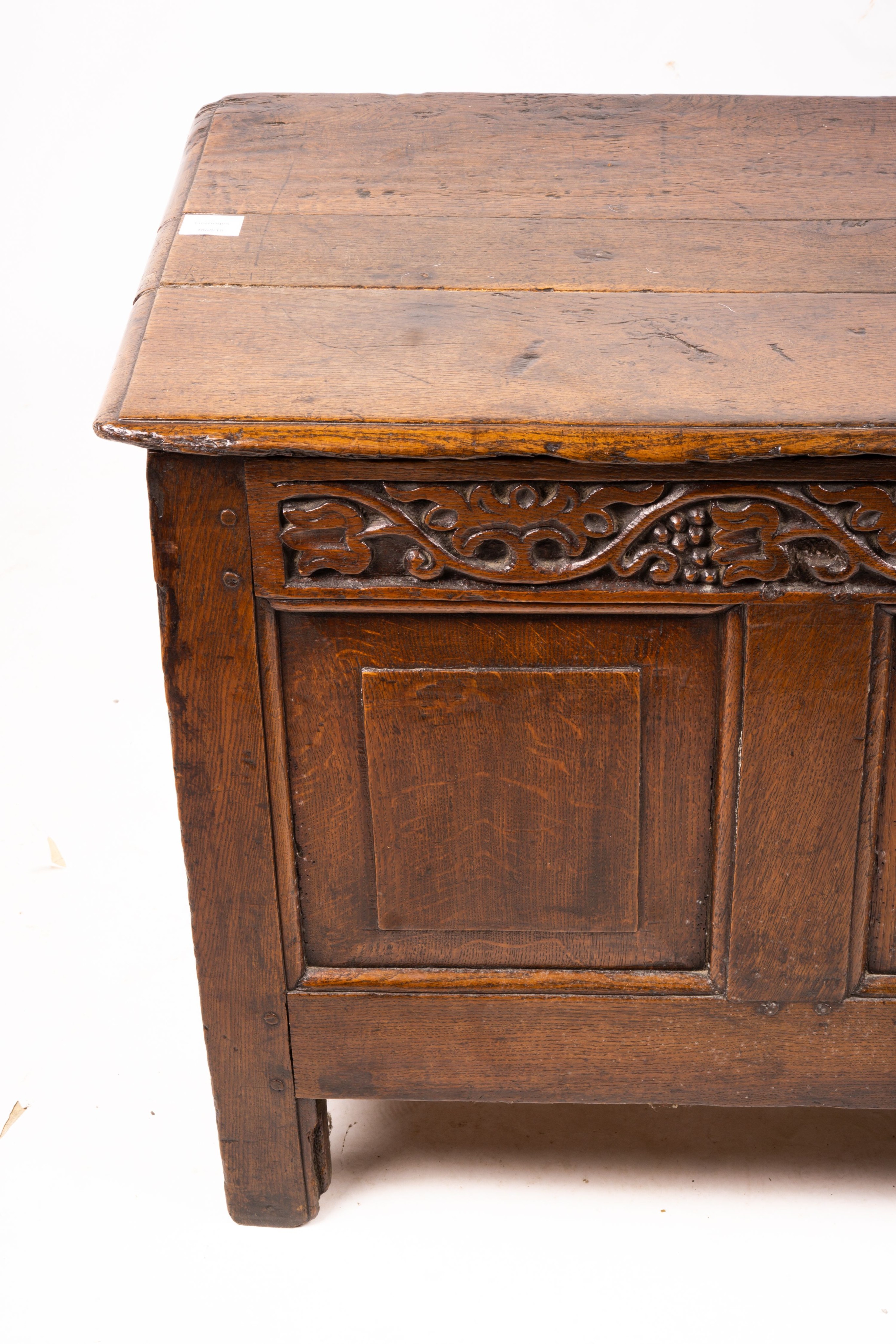 A 17th / 18th century carved oak coffer, length 132cm, depth 53cm, height 64cm